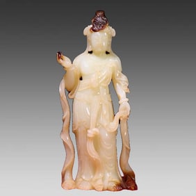 A piece of Hetian white jade soil Qin red Qin Guanyin ornaments