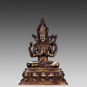 A bronze gilt Ladakh-style four-armed Guanyin
