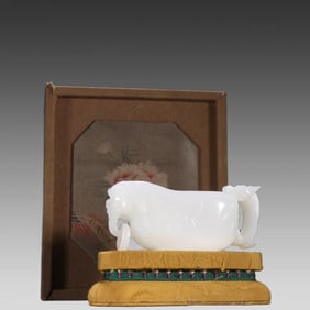 A piece of Qing Dynasty Hetian jade's dragon wine jue