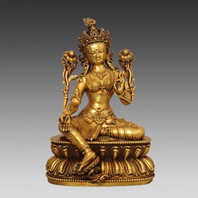 A copper gilt green mother home offering ornament