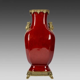 A red glazed bronze vase of the Queen's amphorae