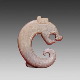 A jade dragon ornament full of gray skin