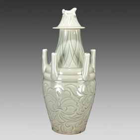 A Song Dynasty Yaozhou kiln carved multi-tube bottle