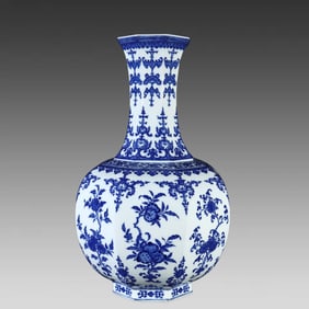 A Qing Dynasty Qianlong blue and white three-flower, three-fruit pattern hexagonal bottle
