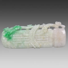 A Qing Dynasty jade plum blossom ornament