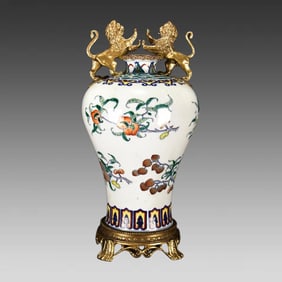 A Qing Dynasty Yongzheng bucket color inlaid with copper gilt folded branch melon and fruit pattern