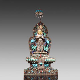 A silver jewel-encrusted statue of Vajrasatta