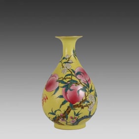A yellow ground grilled flower enamel color pan peach pattern jade pot spring vase
