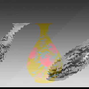 A yellow ground grilled flower enamel color pan peach pattern jade pot spring vase: Qing Dynasty Yongzheng year made yellow ground flower enamel color pan peach pattern jade pot spring bottle SIZE: H:19.8cm BeLLydiameteD:12cm D:5.6cm (The Dimensions Of All Batches Are Manually Measur