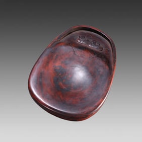 A Qing Dynasty stone mandarin duck playing in the water poetry inkstone