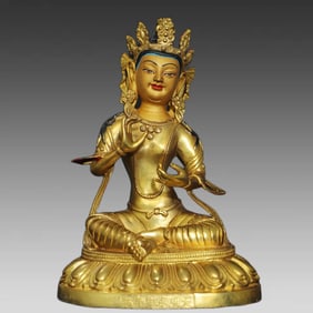 A gilt bronze painted Buddha statue of Tara
