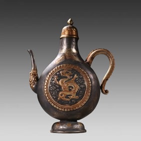 A Tang silver gilt relief engraved dragon pot