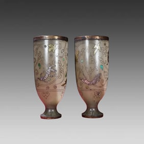 A pair of gold and silver wine glasses for Hetian seeds