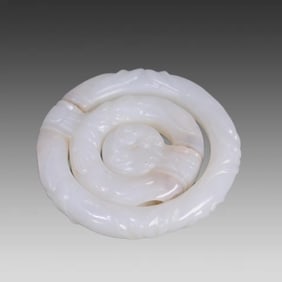 A triple buckle of Hetian jade from the Qing Dynasty