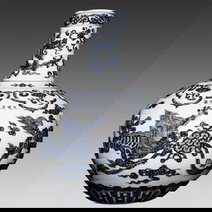 A Ming Dynasty Xuande blue and white lion rolling hydrangea pattern celestial ball bottle: Ming Dynasty Xuande blue and white lion rolling hydrangea pattern celestial ball bottle SIZE: H:42cm D:32cm (The Dimensions Of All Batches Are Manually Measured.If You Need More Detailed Information,