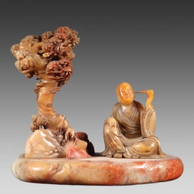 A piece of Shoushan stone tree base arhat