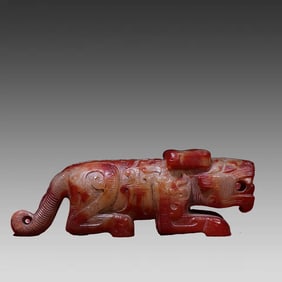 A piece of Tuqin red and white jade tiger handles