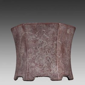 A purple sand carved lotus pattern flower pot
