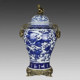 A blue and white Rui beast auspicious cloud pattern inlaid with copper sheep's head amphora general