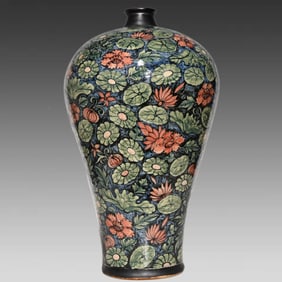 A pair of Yuan Dynasty three-color floral plum vases