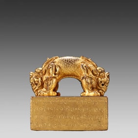 A bronze gilt double-crossed dragon button seal from the Qing Dynasty