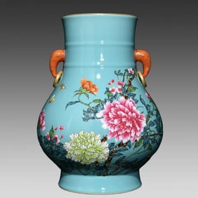 A piece of Qing Dynasty Yongzheng turquoise glaze pastel flower butterfly pattern elephant ear zun