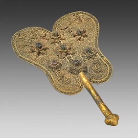 A piece of sterling silver gilt fan