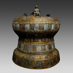 A Warring States bronze four-ox shell storage vessel