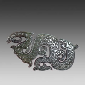 A piece of Hetian jade's Manqin dragon pendant