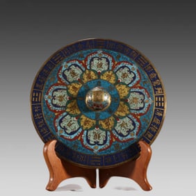 A bronze gilt cloisonné enamel gossip mirror from the Qing Dynasty