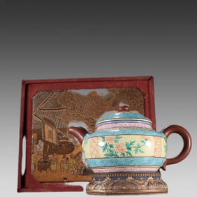 A purple sand painted floral bamboo pattern teapot