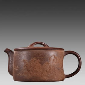 A teapot with a purple sand landscape picture at the beginning of the season