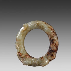 A piece of Hetian jade from the Han Dynasty with a dragon pattern jade