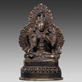 A seated bronze statue of White Tara from the Qing Dynasty