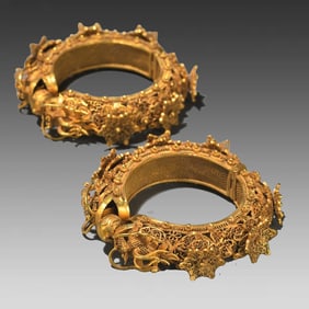 A pair of Tang Dynasty filigree craft double dragon play beads silver gilt bracelet