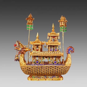 A piece of bronze gilt filigree dragon boat