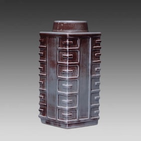 A Qing Dynasty official imitation Jun glazed Bagua Cong-style bottle