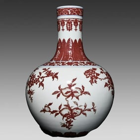A Qing Dynasty Yongzheng glaze red branch flower fruit pattern celestial ball bottle
