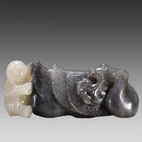 A Qing Dynasty blue and white seed boy goose carving piece of Hetian jade