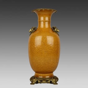 A rusty eel yellow glazed copper-encrusted sheep's head amphora