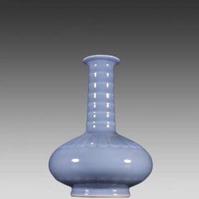 A piece of Qing Dynasty sky blue glaze embossed chrysanthemum petal string pattern bottle