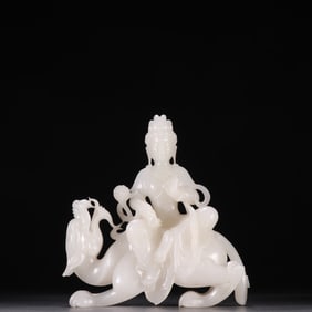 A Qing Dynasty statue of the Imperial Dragon Guanyin of Hetian Jade