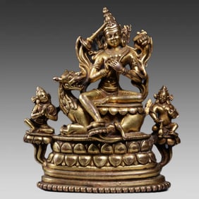 A bronze gilt statue of Manjushri and the donor in the Qing Dynasty