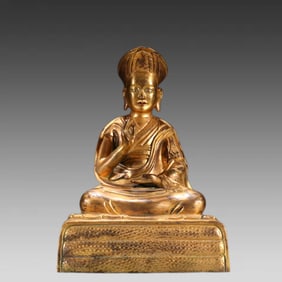 A bronze gilt statue of a Guru from the Qing Dynasty