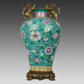 A piece of a pastel lion amphora inlaid with copper kaleido