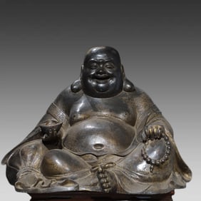 A bronze gold statue of Maitreya Buddha statue