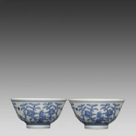 A pair of Ming Dynasty Chenghua blue and white mountain stone folded branch floral pattern cups