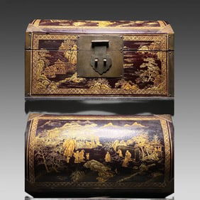 A large lacquer painted gold chest