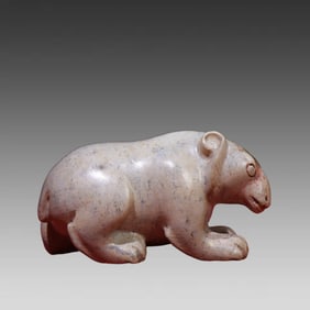 A piece of ancient jade full of carved bears
