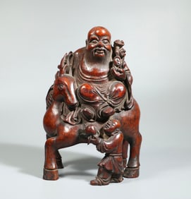 A piece of bamboo root carved birthday boy ornaments